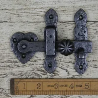 Traditional cast iron Suffolk latch on wooden door