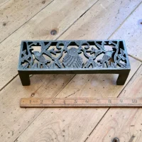 Three Bird air brick trivet in cast antique iron