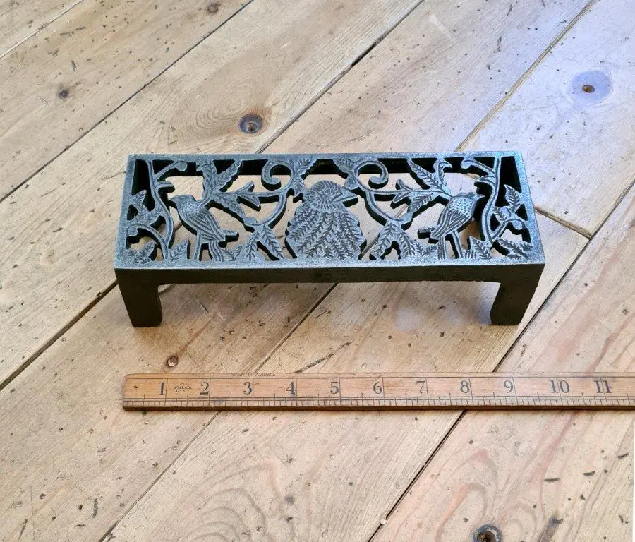 Three Bird air brick trivet in cast antique iron