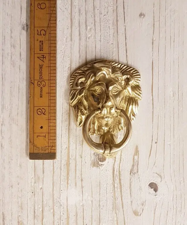 Lion head door knocker in solid brass